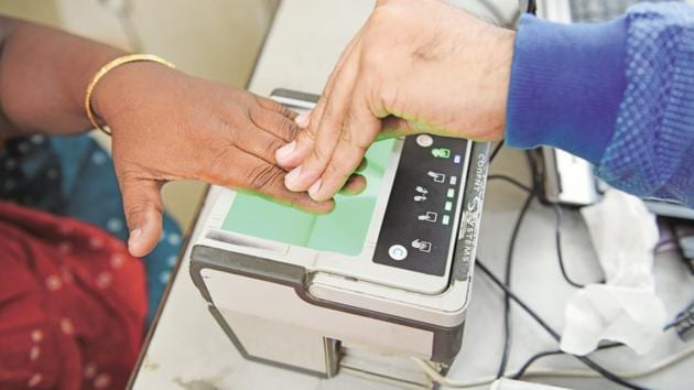 A woman registers her fingerprints at an Aadhaar card centre in Kolkata. (Mint file photo) A woman registers her fingerprints at an Aadhaar card centre in Kolkata. (Mint file photo)