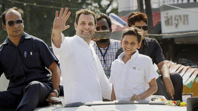 Congress vice-president Rahul Gandhi waving to the crowd during his road show at Valsad district, in Gujarat on Friday. (PTI) Congress vice-president Rahul Gandhi waving to the crowd during his road show at Valsad district, in Gujarat on Friday. (PTI)