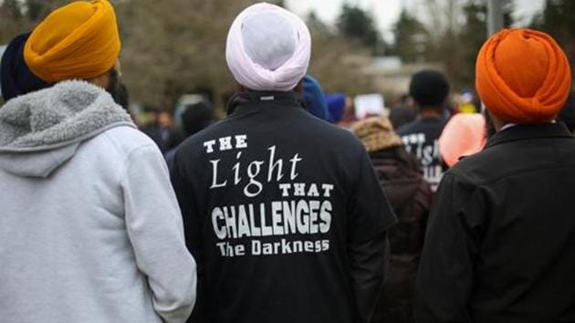 A Sikh man's shirt bears a reference to human rights activist Jaswant Singh Khalra in March 2017. (Reuters File Photo) A Sikh man's shirt bears a reference to human rights activist Jaswant Singh Khalra in March 2017. (Reuters File Photo)
