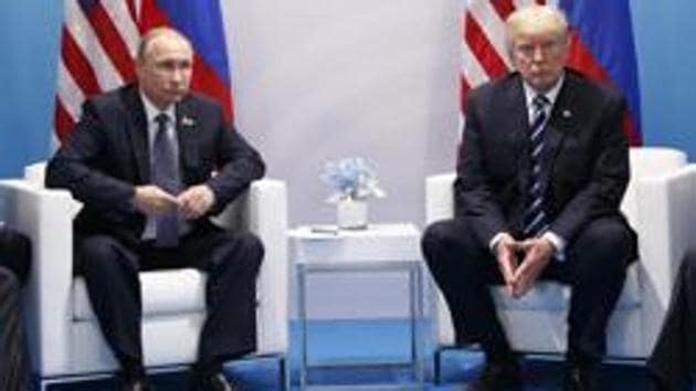 President Donald Trump meets with Russian President Vladimir Putin at the G20 Summit, in Hamburg on July 7, 2017. (AP File Photo) President Donald Trump meets with Russian President Vladimir Putin at the G20 Summit, in Hamburg on July 7, 2017. (AP File Photo)