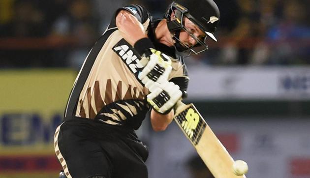 New Zealand cricket team’s Colin Munro hits a six en route century against Indian cricket team in the second T20 at Rajkot on Saturday.(PTI)