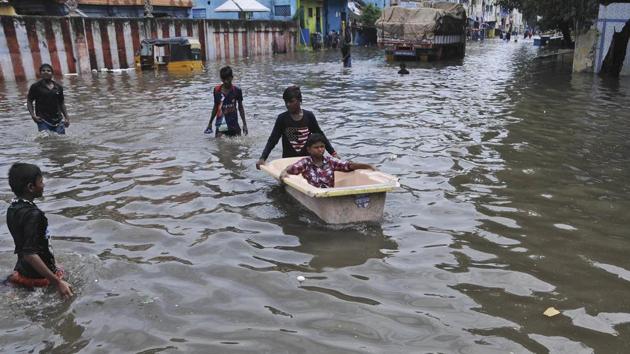 People resort to a bathtub as makeshift boat in a waterlogged street in Chennai, on November 3, 2017. With the northeast monsoon active in the state and neighbouring Puducherry, nearly 74% of the rainfall expected during the entire season was recorded in the first week, the state meteorological department said. (AP) People resort to a bathtub as makeshift boat in a waterlogged street in Chennai, on November 3, 2017. With the northeast monsoon active in the state and neighbouring Puducherry, nearly 74% of the rainfall expected during the entire season was recorded in the first week, the state meteorological department said. (AP)