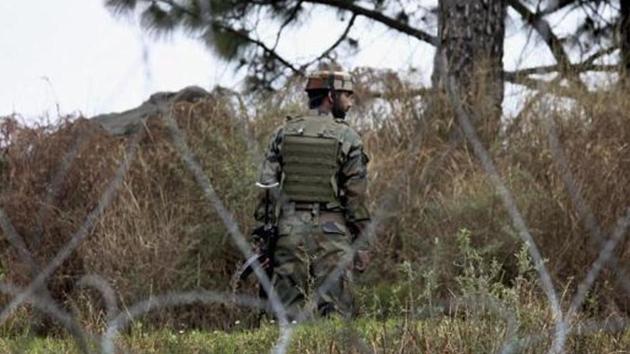 An Indian Army soldier patrols at the LoC in Poonch district of Jammu and Kashmir.(PTI File Photo)