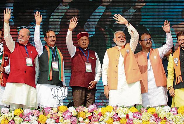 PM Modi with BJP’s CM face Prem Kumar Dhumal and other party leaders in Una on Sunday. (Anil Dayal/HT) PM Modi with BJP’s CM face Prem Kumar Dhumal and other party leaders in Una on Sunday. (Anil Dayal/HT)