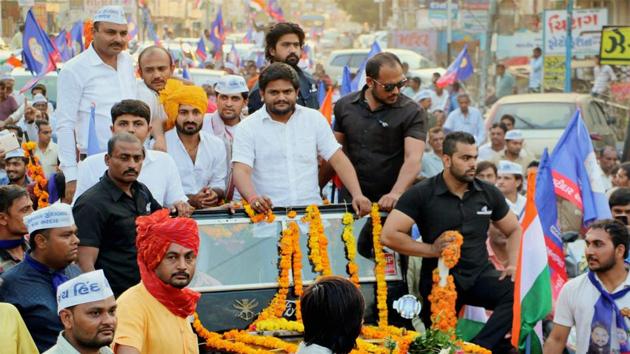 PAAS convener Hardik Patel during a road show in Bhavnagar. The Patel quota stir leader has been protesting against the BJP government and demanding reservation for his community. (PTI FILE) PAAS convener Hardik Patel during a road show in Bhavnagar. The Patel quota stir leader has been protesting against the BJP government and demanding reservation for his community. (PTI FILE)