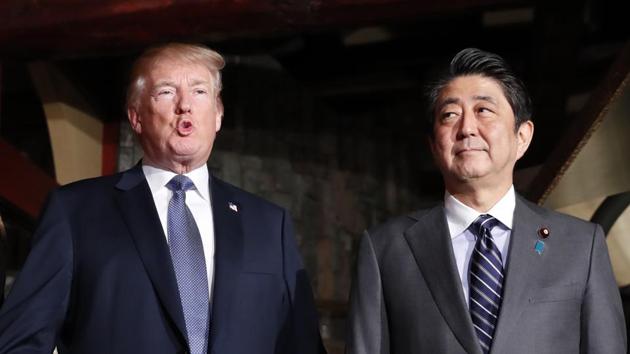Japan's Prime Minister Shinzo Abe and US President Donald Trump meet for a dinner at a restaurant in Tokyo on November 5. (AFP Photo) Japan's Prime Minister Shinzo Abe and US President Donald Trump meet for a dinner at a restaurant in Tokyo on November 5. (AFP Photo)