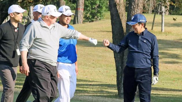 A new Great Game? US President Donald Trump gestures to Japan's Prime Minister Shinzo Abe as Japanese professional golfer Hideki Matsuyama looks on, as they play golf at the Kasumigaseki Country Club in Kawagoe, north of Tokyo on Sunday. (REUTERS) A new Great Game? US President Donald Trump gestures to Japan's Prime Minister Shinzo Abe as Japanese professional golfer Hideki Matsuyama looks on, as they play golf at the Kasumigaseki Country Club in Kawagoe, north of Tokyo on Sunday. (REUTERS)