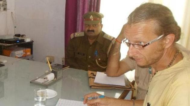 Holger Erik Misch, a German tourist who was held for attacking a policeman, at the Government Railway Police Station in Mirzapur.(HT Photo) Holger Erik Misch, a German tourist who was held for attacking a policeman, at the Government Railway Police Station in Mirzapur.(HT Photo)