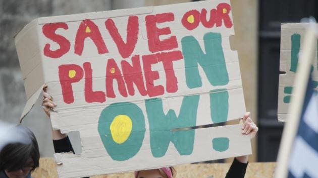 People march during a demonstration two days before the start of the COP 23 in Bonn