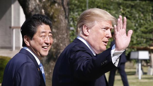 US President Donald Trump (right) and Japan's Prime Minister Shinzo Abe walk before their working lunch at Akasaka Palace in Tokyo, on November 6, 2017. (AP Photo) US President Donald Trump (right) and Japan's Prime Minister Shinzo Abe walk before their working lunch at Akasaka Palace in Tokyo, on November 6, 2017. (AP Photo)