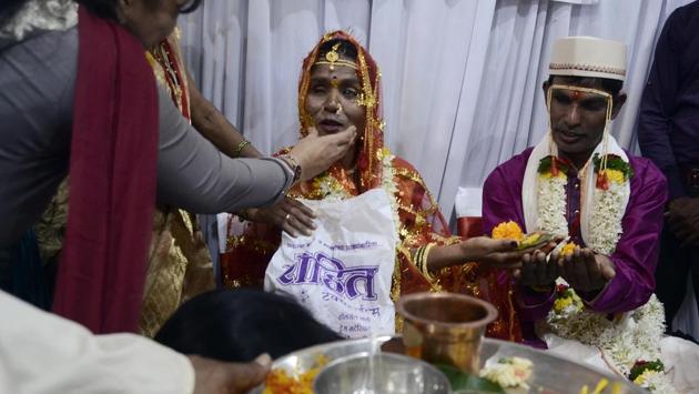 The Krip’s foundation facilitated the weddings by assisting in the legal paperwork for the visually impaired couples. The foundation organised the ceremony with the consent of the parents and relatives of those participating and dedicated 25 priests to officiate the wedding ceremony. (Ravindra Joshi / HT Photo) The Krip’s foundation facilitated the weddings by assisting in the legal paperwork for the visually impaired couples. The foundation organised the ceremony with the consent of the parents and relatives of those participating and dedicated 25 priests to officiate the wedding ceremony. (Ravindra Joshi / HT Photo)
