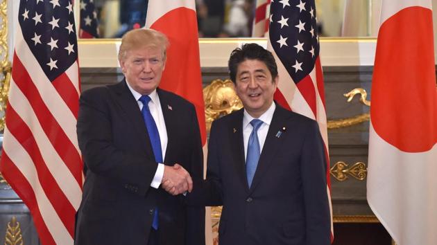 US President Donald Trump (L) shakes hands with Japanese Prime Minister Shinzo Abe (R) before a summit meeting at Akasaka Palace in Tokyo on Sunday. (AFP) US President Donald Trump (L) shakes hands with Japanese Prime Minister Shinzo Abe (R) before a summit meeting at Akasaka Palace in Tokyo on Sunday. (AFP)