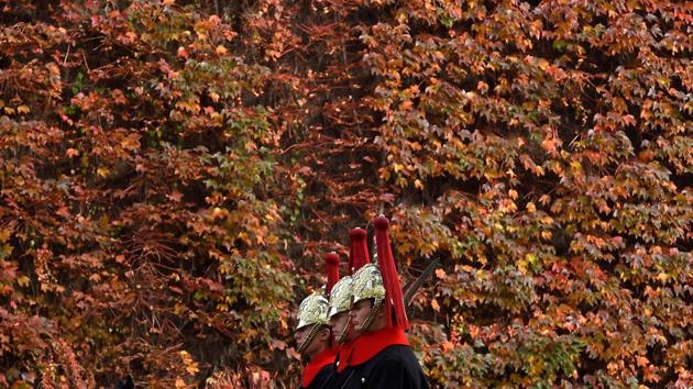 Members of the Household Cavalry ride past autumn foliage in central London, Britain. Nature, with its various shades of red, yellow, orange and brown, provides moments of infinite calm. (Toby Melville / REUTERS) Members of the Household Cavalry ride past autumn foliage in central London, Britain. Nature, with its various shades of red, yellow, orange and brown, provides moments of infinite calm. (Toby Melville / REUTERS)
