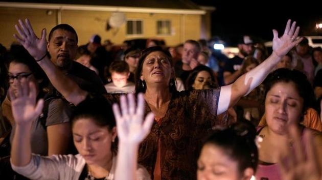 Residents attend a vigil after the mass shooting at the First Baptist Church in Sutherland Springs, Texas. The church, of the protestant First Baptist Church was a place for friends to gather and meet every weekend. (Sergio Flores / REUTERS) Residents attend a vigil after the mass shooting at the First Baptist Church in Sutherland Springs, Texas. The church, of the protestant First Baptist Church was a place for friends to gather and meet every weekend. (Sergio Flores / REUTERS)