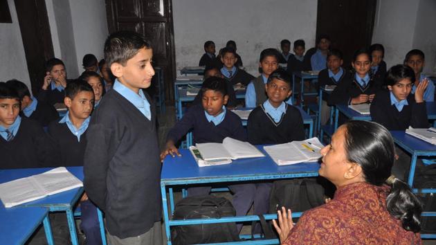 Principal secretary Radha Raturi (right) interacts with students at the government school. (Vinay S Kumar/HT Photo) Principal secretary Radha Raturi (right) interacts with students at the government school. (Vinay S Kumar/HT Photo)