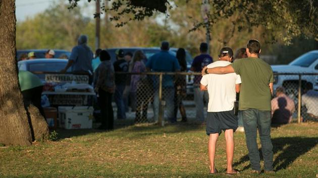 Men comfort each other at a community centre after a mass shooting at the First Baptist Church in Sutherland Springs, Texas. (American-Statesman via Reuters) Men comfort each other at a community centre after a mass shooting at the First Baptist Church in Sutherland Springs, Texas. (American-Statesman via Reuters)