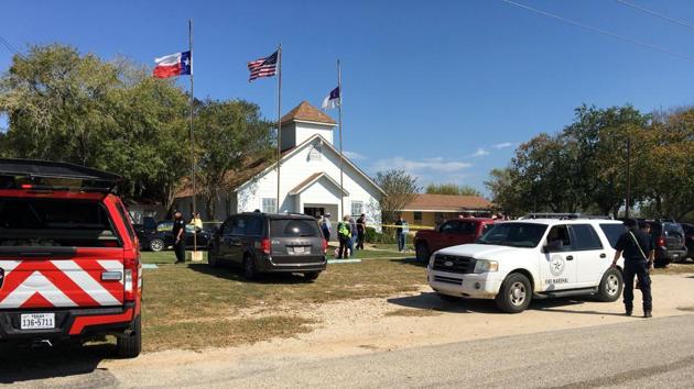 The area around a site of a shooting is cordoned off by state and federal investigators in Sutherland Springs, Texas. Authorities described the shooter as only a ‘young white male in his early-20s’, but news reports identified him as Devin P Kelley, a 26-year-old from Houston. He once served with the US air force, in logistics and taught toddlers in an elementary school. (Max Massey / KSAT 12 via REUTERS) The area around a site of a shooting is cordoned off by state and federal investigators in Sutherland Springs, Texas. Authorities described the shooter as only a ‘young white male in his early-20s’, but news reports identified him as Devin P Kelley, a 26-year-old from Houston. He once served with the US air force, in logistics and taught toddlers in an elementary school. (Max Massey / KSAT 12 via REUTERS)