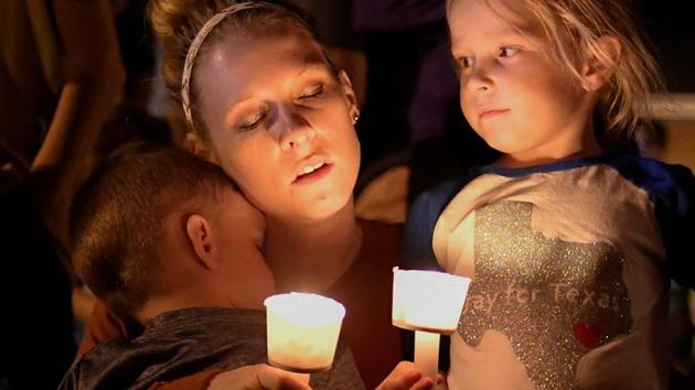 A woman and her children take part in a vigil for victims of a mass shooting in Sutherland Springs, Texas. The incident is the latest in a string of mass shootings that bring into focus liberal gun rules in United States, which was last rattled a month ago when a man fired into a concert in Las Vegas using heavy weapons. (Mohammad Khursheed / REUTERS) A woman and her children take part in a vigil for victims of a mass shooting in Sutherland Springs, Texas. The incident is the latest in a string of mass shootings that bring into focus liberal gun rules in United States, which was last rattled a month ago when a man fired into a concert in Las Vegas using heavy weapons. (Mohammad Khursheed / REUTERS)