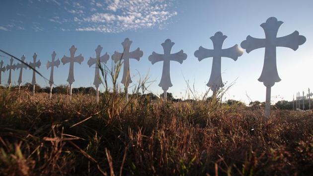 Crosses in a field on the edge of Sutherland Springs, Texas honour the 26 people killed at the town’s First Baptist Church on Sunday. (AFP) Crosses in a field on the edge of Sutherland Springs, Texas honour the 26 people killed at the town’s First Baptist Church on Sunday. (AFP)