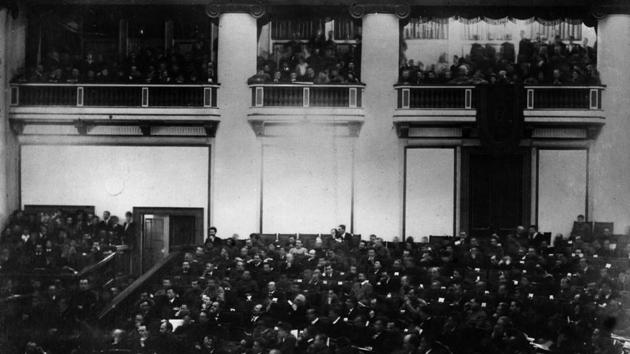 The historic session of the Constituent Assembly at the Tauride Palace, Petrograd in 1917. With communication lines overrun by pro-Bolshevik workers and soldiers, the Provisional Government was cut off from the outside world and eventually surrendered to the seizing forces. With the fall of the Winter Palace the Congress announced transfer of power to the Soviets, effectively ratifying the results of the Revolution. (Hulton Archive / Getty Images)
