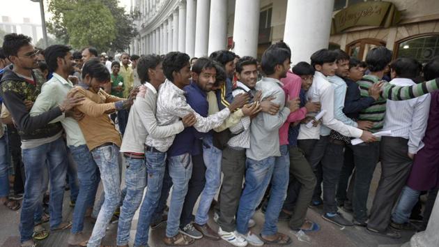 People stand in queue outside a bank in Connaught Place in New Delhi, November 2016. A year ago, Prime Minister Narendra Modi announced the scrapping of high-value banknotes which amounted to 86% of currency in circulation. (Ravi Choudhary / HT Photo) People stand in queue outside a bank in Connaught Place in New Delhi, November 2016. A year ago, Prime Minister Narendra Modi announced the scrapping of high-value banknotes which amounted to 86% of currency in circulation. (Ravi Choudhary / HT Photo)