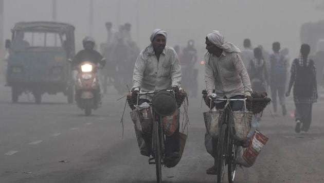Commuters drive amid heavy smog in New Delhi on Tuesday. The city woke up to a choking blanket of smog as air quality in the world's most polluted capital city reached hazardous levels. (AFP) Commuters drive amid heavy smog in New Delhi on Tuesday. The city woke up to a choking blanket of smog as air quality in the world's most polluted capital city reached hazardous levels. (AFP)