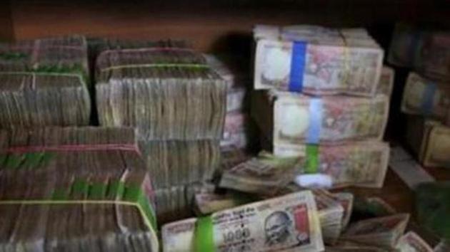 The BJP will organise panel discussions, hold rallies also distribute pamphlets to create awareness about the positive effects of demonetisation in fighting the menace of black money. (AP) The BJP will organise panel discussions, hold rallies also distribute pamphlets to create awareness about the positive effects of demonetisation in fighting the menace of black money. (AP)