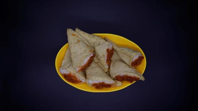 A plate of Dububab, or ‘tofu rice’ found in most markets across North Korea. Tofu skins stuffed with rice are topped with a chilli sauce for a quick fix. Pyongyang says 70% of North Koreans use the state’s central distribution system as their main source of food, the same number that the UN estimates as ‘food insecure.’ But surveys and anecdotal evidence from defectors suggest private markets or jangmadang are the main source of supply for most North Koreans. (Kim Hong-Ji / REUTERS) A plate of Dububab, or ‘tofu rice’ found in most markets across North Korea. Tofu skins stuffed with rice are topped with a chilli sauce for a quick fix. Pyongyang says 70% of North Koreans use the state’s central distribution system as their main source of food, the same number that the UN estimates as ‘food insecure.’ But surveys and anecdotal evidence from defectors suggest private markets or jangmadang are the main source of supply for most North Koreans. (Kim Hong-Ji / REUTERS)