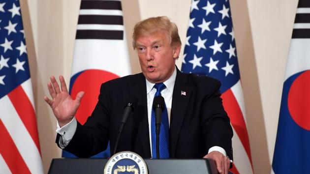 US President Donald Trump gestures as he speaks during a joint press conference with South Korea's President Moon Jae-in (not pictured) at the presidential Blue House in Seoul, South Korea, November 7, 2017. (REUTERS) US President Donald Trump gestures as he speaks during a joint press conference with South Korea's President Moon Jae-in (not pictured) at the presidential Blue House in Seoul, South Korea, November 7, 2017. (REUTERS)