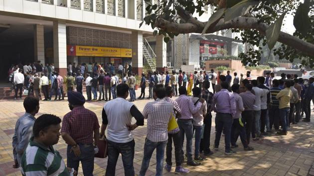 People queue up to withdraw or deposit their money as the 1000 and 500 (old) rupee notes were withdrawn from the market last November. (Sushil Kumar / HT Photo) People queue up to withdraw or deposit their money as the 1000 and 500 (old) rupee notes were withdrawn from the market last November. (Sushil Kumar / HT Photo)