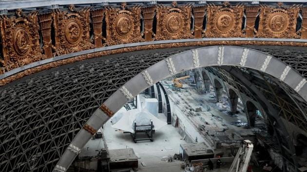 Cosmos Pavilion under reconstruction at the Exhibition of Achievements of National Economy in Moscow. The coat of arms of the USSR, of the 15 former Soviet republics and the emblems of the sectors of the economy were found at the base of the dome of the pavilion behind false panels during restoration work. (Maxim Shemetov / Reuters)