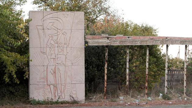 A Soviet-Era monument with a sickle and a hammer which were displayed on the coat of arms of the Soviet Union, stands in Simferopol, Crimea. (Pavel Rebrov / REUTERS)