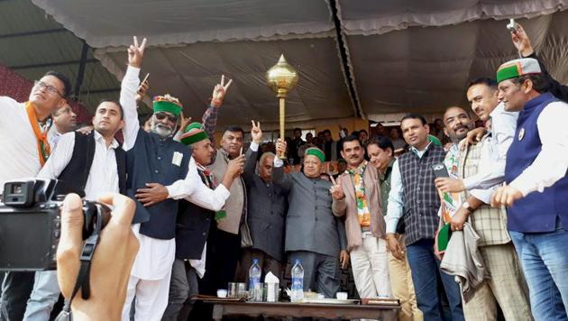 Himachal Pradesh chief minister Virbhadra Singh with supporters during an election rally at Kunihar in Shimla on Tuesday. (PTI) Himachal Pradesh chief minister Virbhadra Singh with supporters during an election rally at Kunihar in Shimla on Tuesday. (PTI)