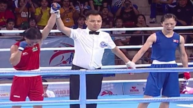 Mary Kom (L) defeated DPR Korea’s Kim Hyang Mi (in blue) 5-0 by unanimous judges decision.(YouTube)