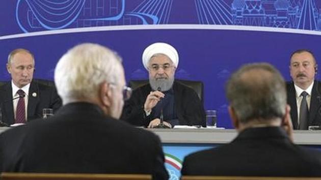 (From left) Russian President Vladimir Putin, Iran’s President Hassan Rouhani and Azerbaijan’s President Ilham Aliyev attend a news conference following the talks in Tehran on November 1. (Reuters File Photo) (From left) Russian President Vladimir Putin, Iran’s President Hassan Rouhani and Azerbaijan’s President Ilham Aliyev attend a news conference following the talks in Tehran on November 1. (Reuters File Photo)
