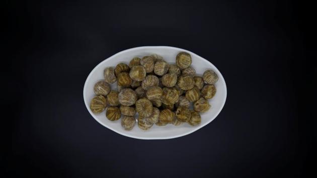 North Korea’s market sellers have long made their own candy. Alsatang is a homemade treat made of sugar and vinegar, similar to traditional sugar plums. Small bags are handed out to school children on special occasions like April 15, the birth anniversary of North Korea’s founding president Kim Il Sung. (Kim Hong-Ji / REUTERS) North Korea’s market sellers have long made their own candy. Alsatang is a homemade treat made of sugar and vinegar, similar to traditional sugar plums. Small bags are handed out to school children on special occasions like April 15, the birth anniversary of North Korea’s founding president Kim Il Sung. (Kim Hong-Ji / REUTERS)