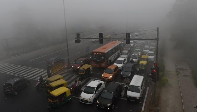 Commuters drive amid heavy smog in New Delhi. (AFP) Commuters drive amid heavy smog in New Delhi. (AFP)