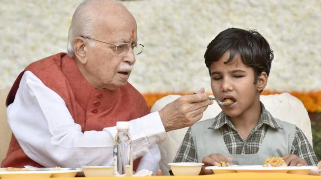 On his 90th birthday, BJP leader LK Advani had breakfast with 90 blind children at his residence in New Delhi on Wednesday. (Sonu Mehta/HT PHOTO) On his 90th birthday, BJP leader LK Advani had breakfast with 90 blind children at his residence in New Delhi on Wednesday. (Sonu Mehta/HT PHOTO)