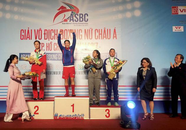 Mary Kom (centre)  dedicated the Asian Championship win to those who stuck by her after many had written her off. (PTI) 