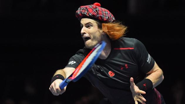 Andy Murray can be seen here wearing a tartan hat as he plays Roger Federer. (AFP) Andy Murray can be seen here wearing a tartan hat as he plays Roger Federer. (AFP)