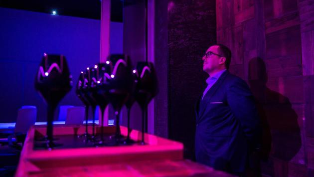 A view inside the dining room at the secretive Ultraviolet restaurant with the ambience defined by a mood projection. Guests are taken on a culinary world tour, while mood music ranges from Claude Debussy to AC/DC. Pairet’s take on fish-and-chips for instance comes in a London rainshower to the Beatles’ “Ob-La-Di, Ob-La-Da”. (Chandan Khanna / AFP) 