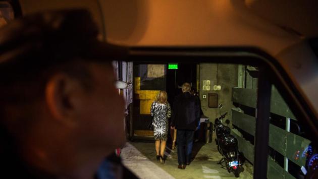 A van spirits Ultraviolet restaurant’s ten nightly diners to its secret Shanghai location where they enter a minimalist dining room in a non-descript industrial building to Wagner’s theme from “2001: A Space Odyssey”. (Chandan Khanna / AFP) 