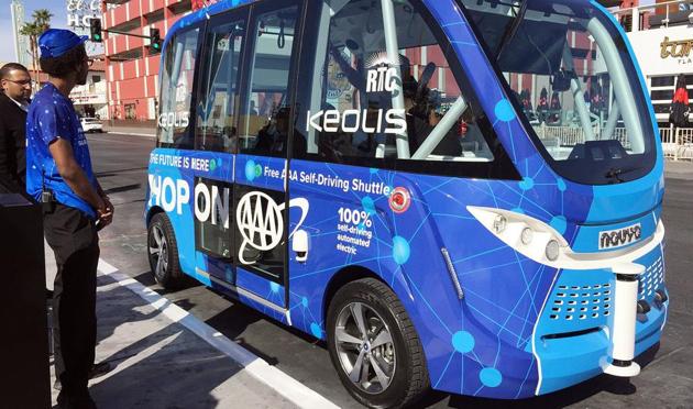 Patrons wait to board the driverless shuttle bus in Las Vegas on November 8, 2017.(AP) Patrons wait to board the driverless shuttle bus in Las Vegas on November 8, 2017.(AP)