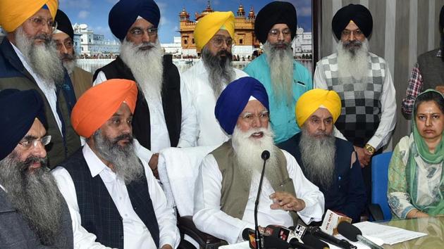 SGPC president Kirpal Singh Badungar (centre) and other members at a press conference in Amritsar on Thursday.(HT Photo) SGPC president Kirpal Singh Badungar (centre) and other members at a press conference in Amritsar on Thursday.(HT Photo)