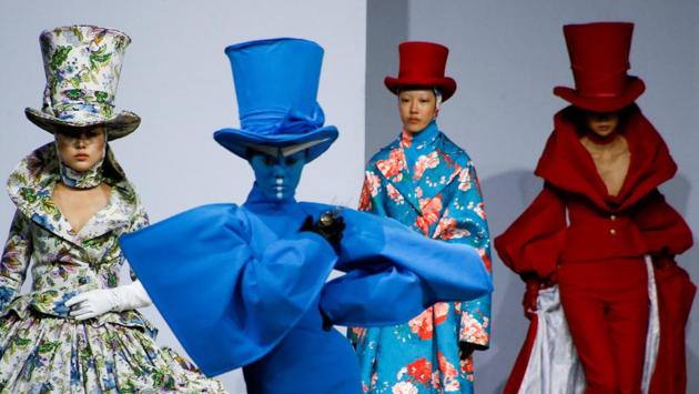 Models present creations by Hu Sheguang at the China Fashion Week in Beijing. (Thomas Peter / REUTERS) Models present creations by Hu Sheguang at the China Fashion Week in Beijing. (Thomas Peter / REUTERS)