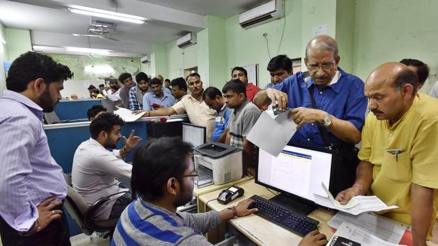 Those wishing to avoid the heavy rush at the MCG offices can now call MCG officials and make the payment by debit/credit card, cash or cheque (Sanjeev Verma/HT FILE PHOTO) Those wishing to avoid the heavy rush at the MCG offices can now call MCG officials and make the payment by debit/credit card, cash or cheque (Sanjeev Verma/HT FILE PHOTO)