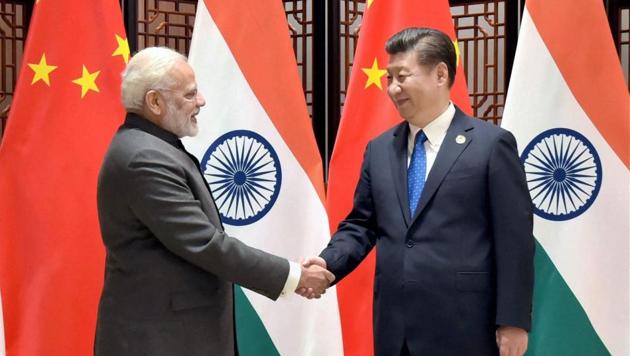 Prime Minister Narendra Modi meeting Chinese president Xi Jinping on the sidelines of the 9th BRICS Summit in Xiamenin May 2017. (PTI File Photo) Prime Minister Narendra Modi meeting Chinese president Xi Jinping on the sidelines of the 9th BRICS Summit in Xiamenin May 2017. (PTI File Photo)