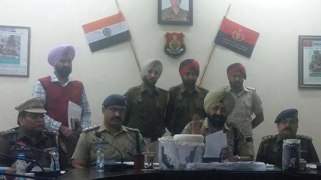Police claim to have recovered three weapons, including a .12 bore gun, along with two .315 pistols and a car. (HT Photo) Police claim to have recovered three weapons, including a .12 bore gun, along with two .315 pistols and a car. (HT Photo)
