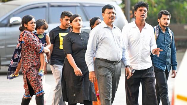 Family members of the doctor who committed suicide at Siddharth hospital,Goregaon, on Thursday. (Satyabrata Tripathy/HT) Family members of the doctor who committed suicide at Siddharth hospital,Goregaon, on Thursday. (Satyabrata Tripathy/HT)