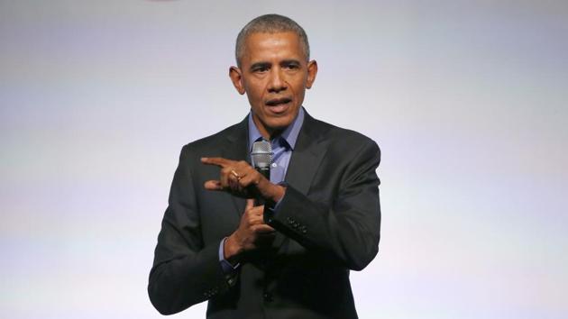 Former US president Barack Obama addresses the crowd as the last speaker at final session of the Obama Foundation Summit.(AP)